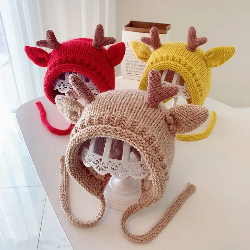 Cute winter baby beanie with elk antlers – warm knitted hat with ear protection 2